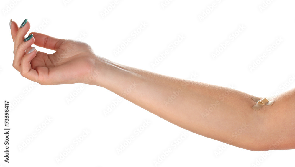 Wounded hand with plaster isolated on white Wounded hand with plaster isolated on white