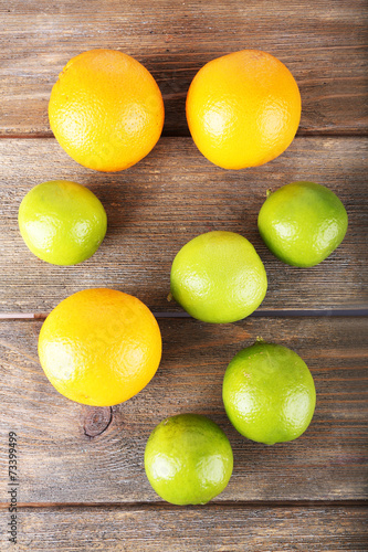 Ripe citrus on wooden background