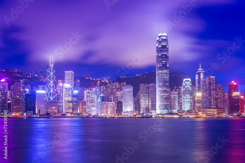 Hong Kong Victoria Harbour cityscape at night. © orpheus26