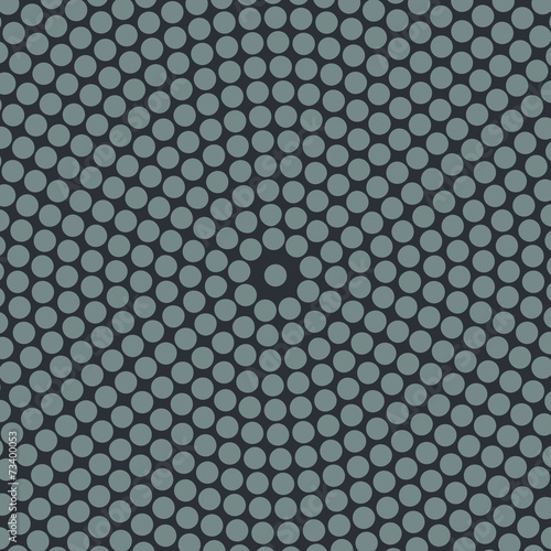 Circular halftone of gray circles on a gray background