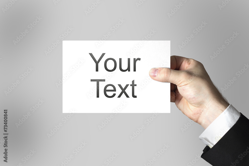 hand holding white card your text hand holding white card your text