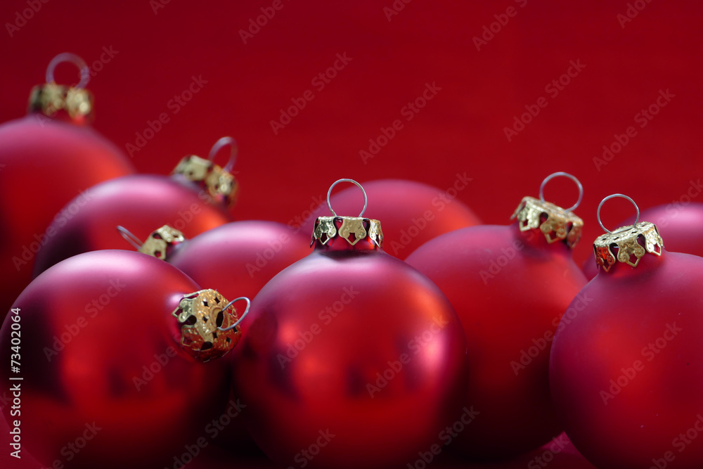 group of red christmas balls, red background, copy space group of red christmas balls, red background, copy space