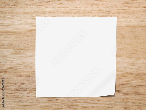 white paper note on Texture of wood background closeup