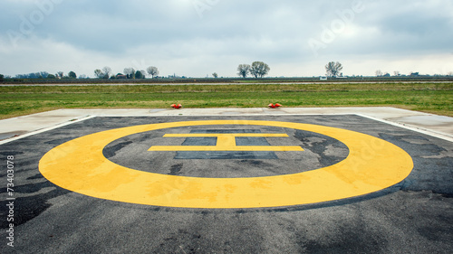 Helicopter sign in landing area. © pio3