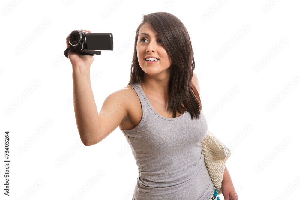 Beautiful tourist with video camera Beautiful tourist with video camera