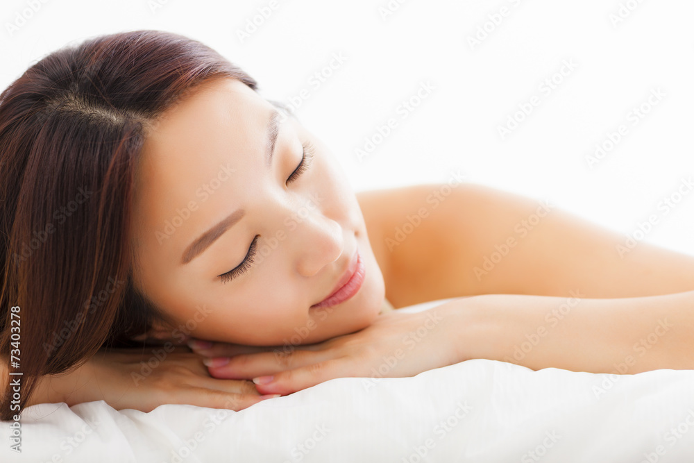 young Beautiful asian woman relaxing on the bed young Beautiful asian woman relaxing on the bed