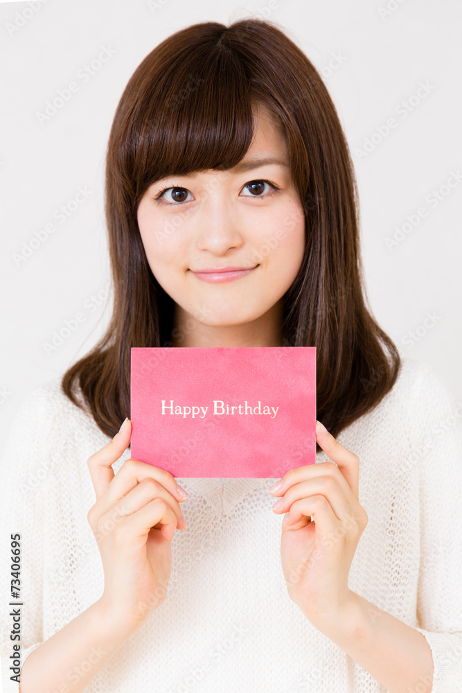 young asian woman with gift on white background young asian woman with gift on white background