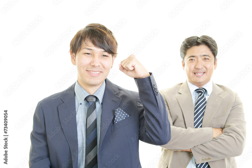 ガッツポーズの二人のビジネスマン ガッツポーズの二人のビジネスマン