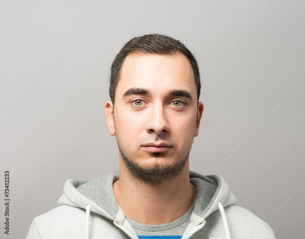 Fototapeta premium I am so happy! Happy young man gesturing while standing