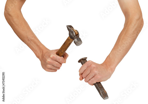 Fotografija Male hands working with hammer and chisel