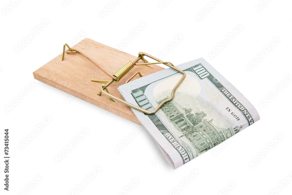 Money in a mousetrap on a white background Money in a mousetrap on a white background