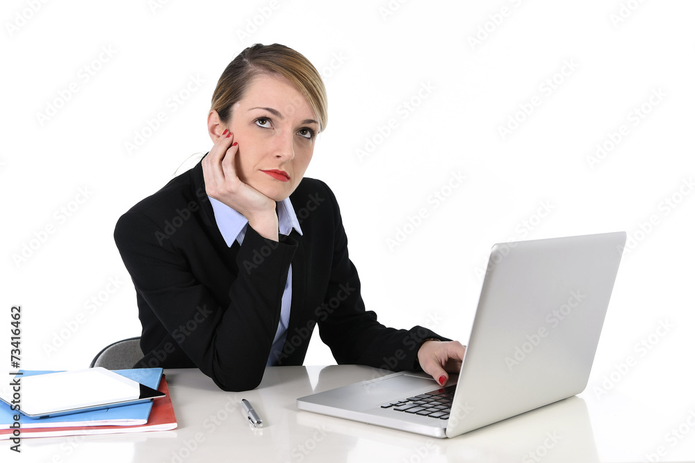 businesswoman thinking distraught while computer working businesswoman thinking distraught while computer working