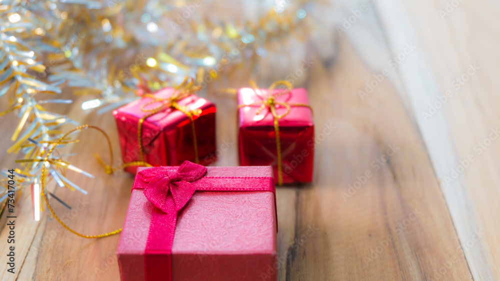 Christmas and New Year gift box Background on a wooden. Christmas and New Year gift box Background on a wooden.