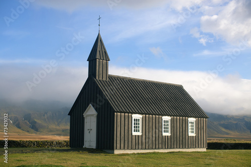 Black Wooden church in autumn in Budir, Iceland