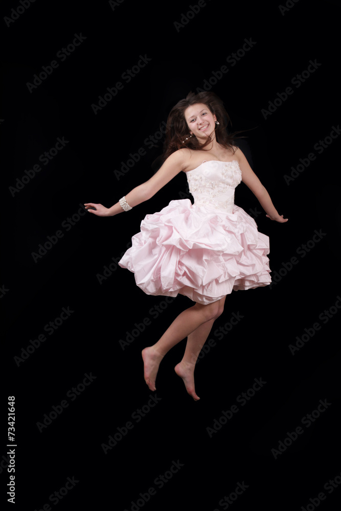 Fototapeta premium Excited dreamy young woman before the ball