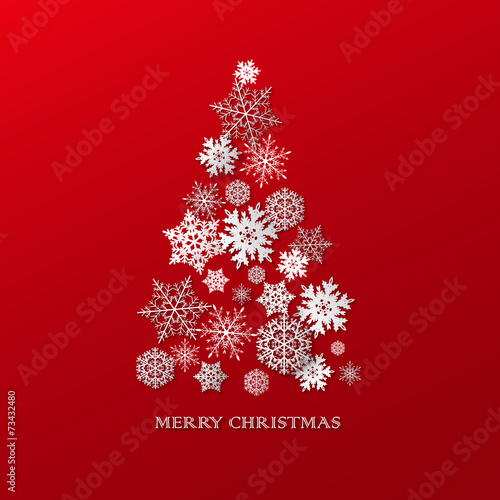 New year background with Christmas tree made of paper snowflakes