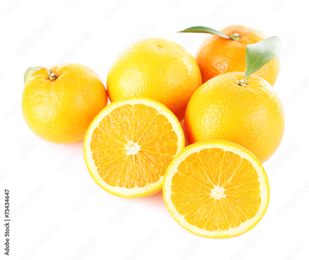 Ripe tangerines and oranges with leaves isolated on white