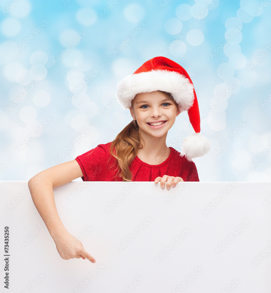 girl in santa helper hat with blank white board girl in santa helper hat with blank white board