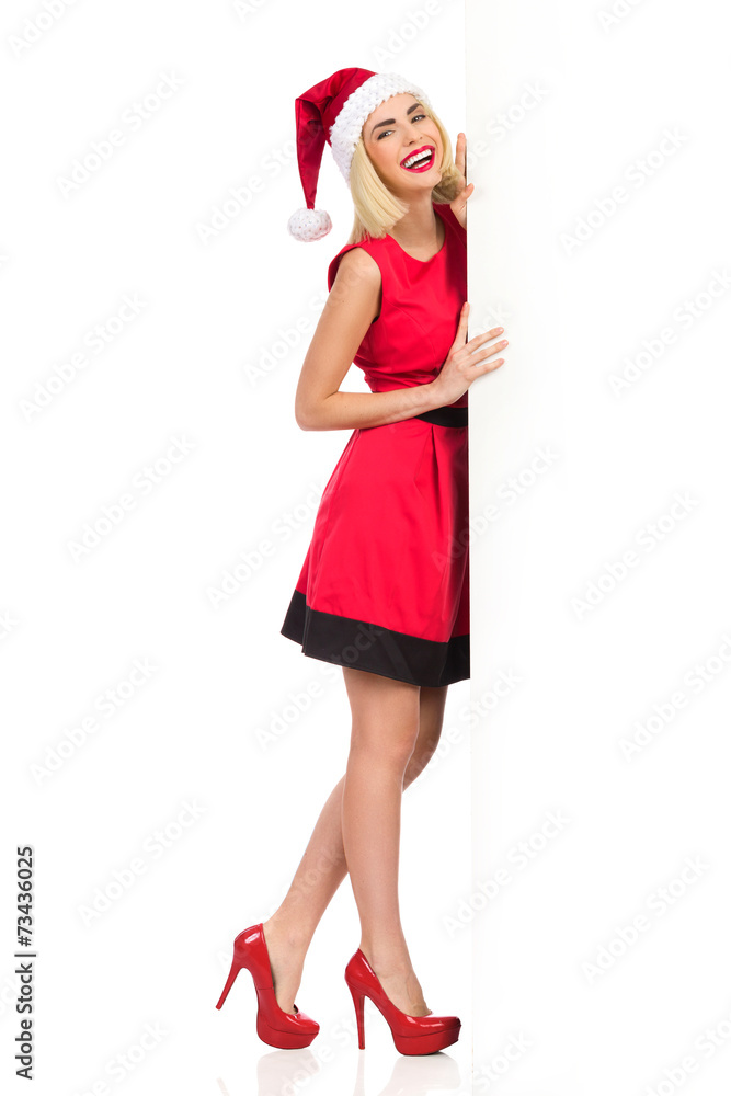 Smiling Santa Girl and big white copy space Smiling Santa Girl and big white copy space