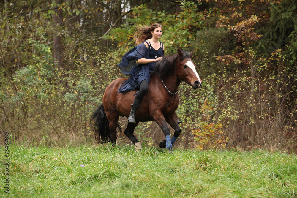 Amazing girl with horse running without bridle and saddle Amazing girl with horse running without bridle and saddle