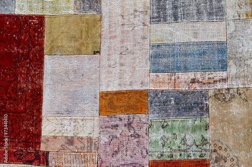 Patchwork rug texture with traditional Turkish motifs