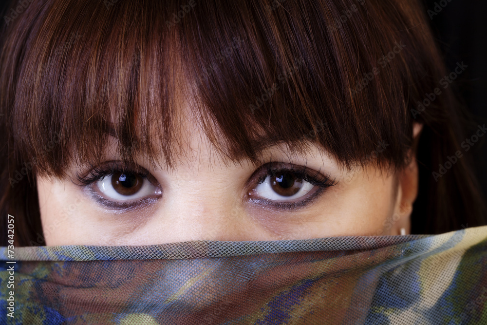 Fototapeta premium Older Caucasian Woman Holding Cloth Over Face