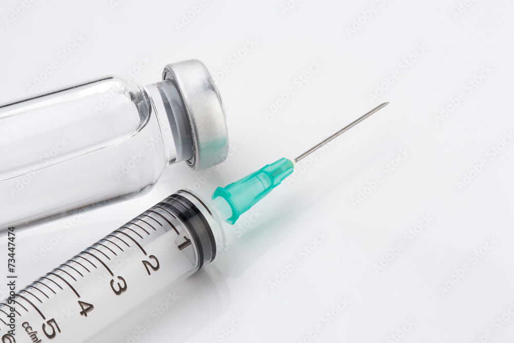 medical ampoules and syringe on white background medical ampoules and syringe on white background