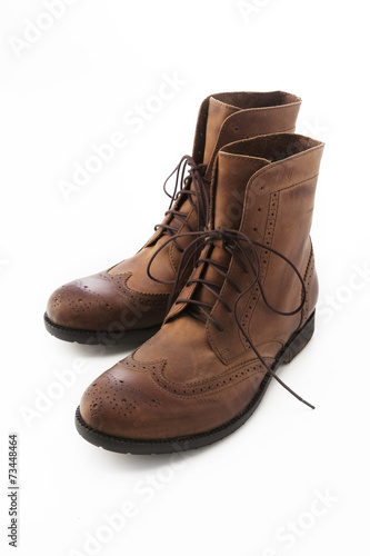 Brown boot on white background