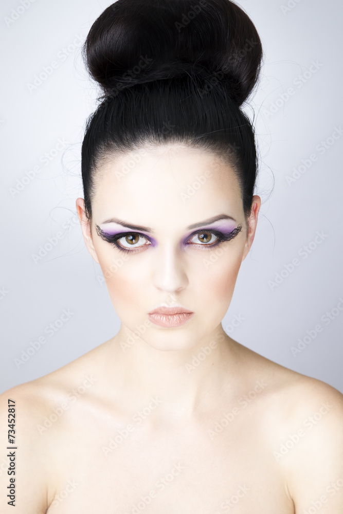 Professional makeup and hairstyle beautiful young woman close up Professional makeup and hairstyle beautiful young woman close up