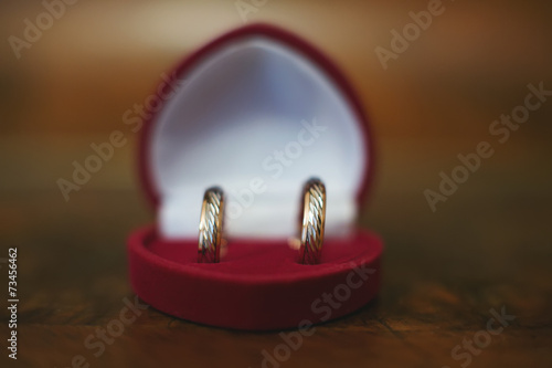 Wedding rings in a heart shaped box © BestForYou