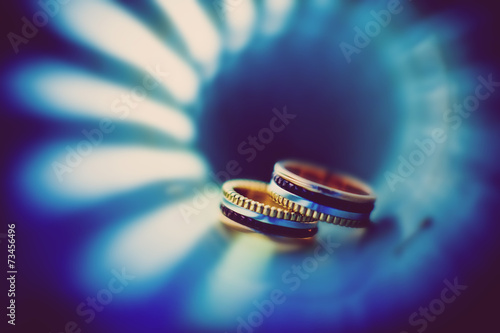 Stylish wedding rings. Details of the wedding day.