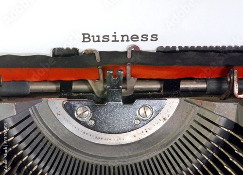 Business written with ink with the old typewriter