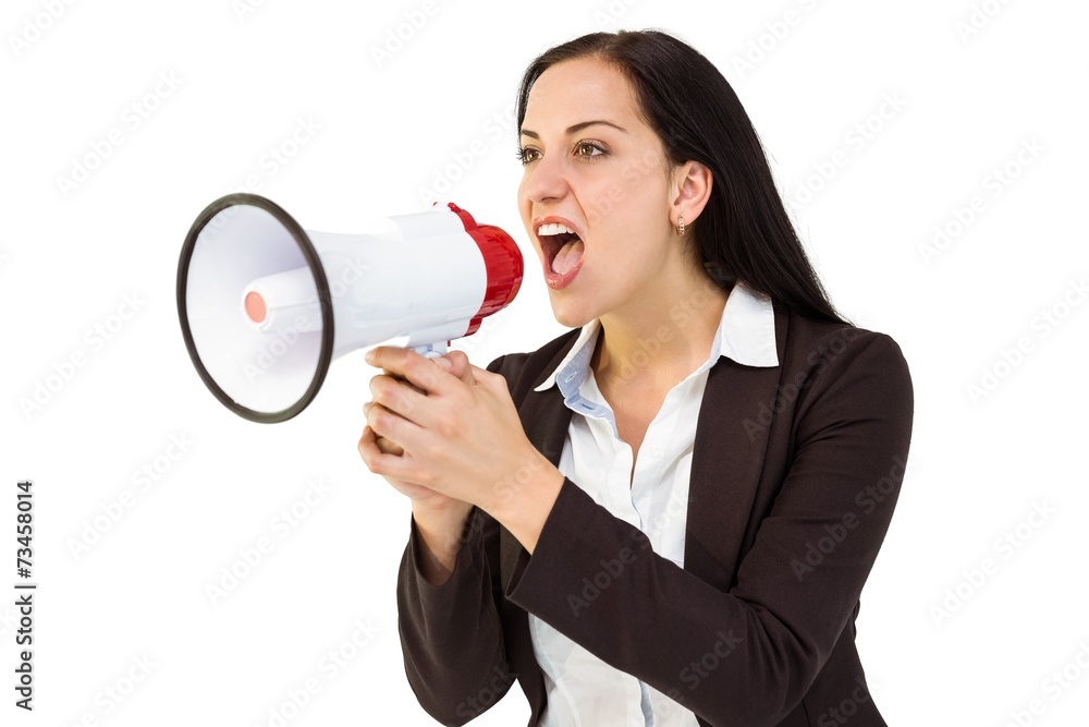 Pretty businesswoman shouting with megaphone Pretty businesswoman shouting with megaphone