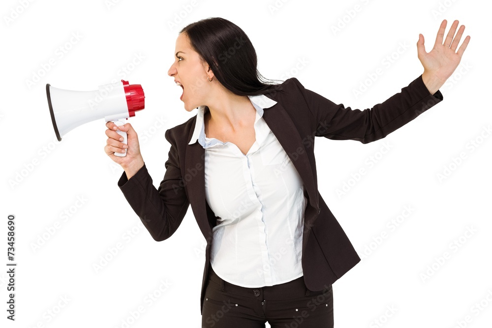 Pretty businesswoman shouting with megaphone Pretty businesswoman shouting with megaphone