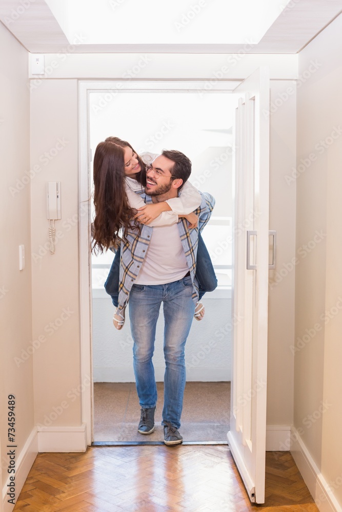 Cute couple walking through the door Cute couple walking through the door