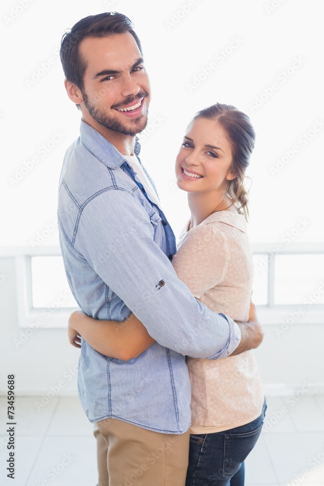 Cute couple hugging and smiling Cute couple hugging and smiling