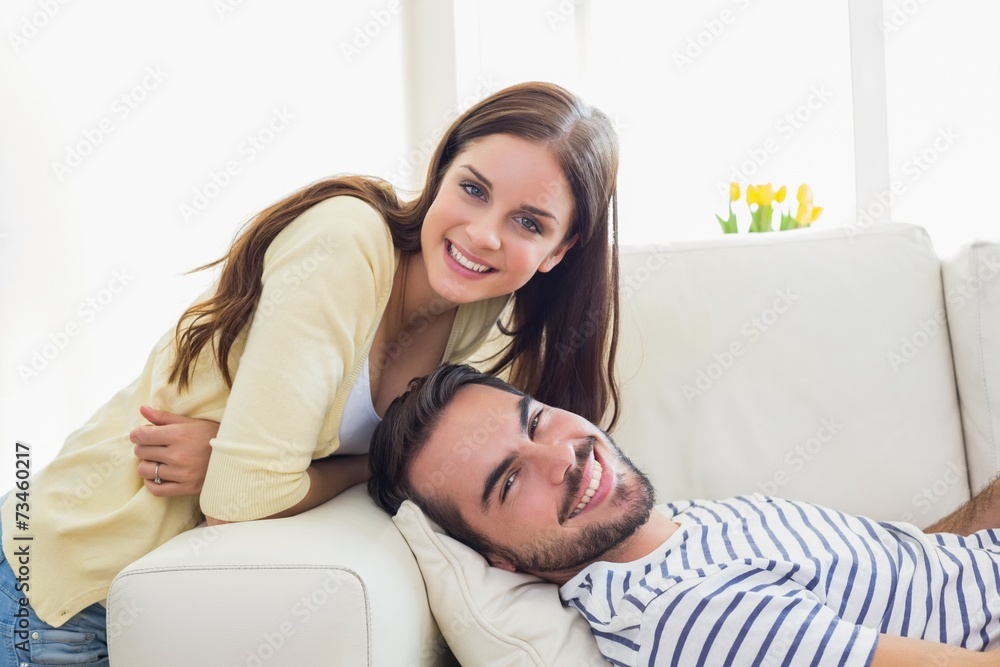 Cute couple relaxing on couch Cute couple relaxing on couch