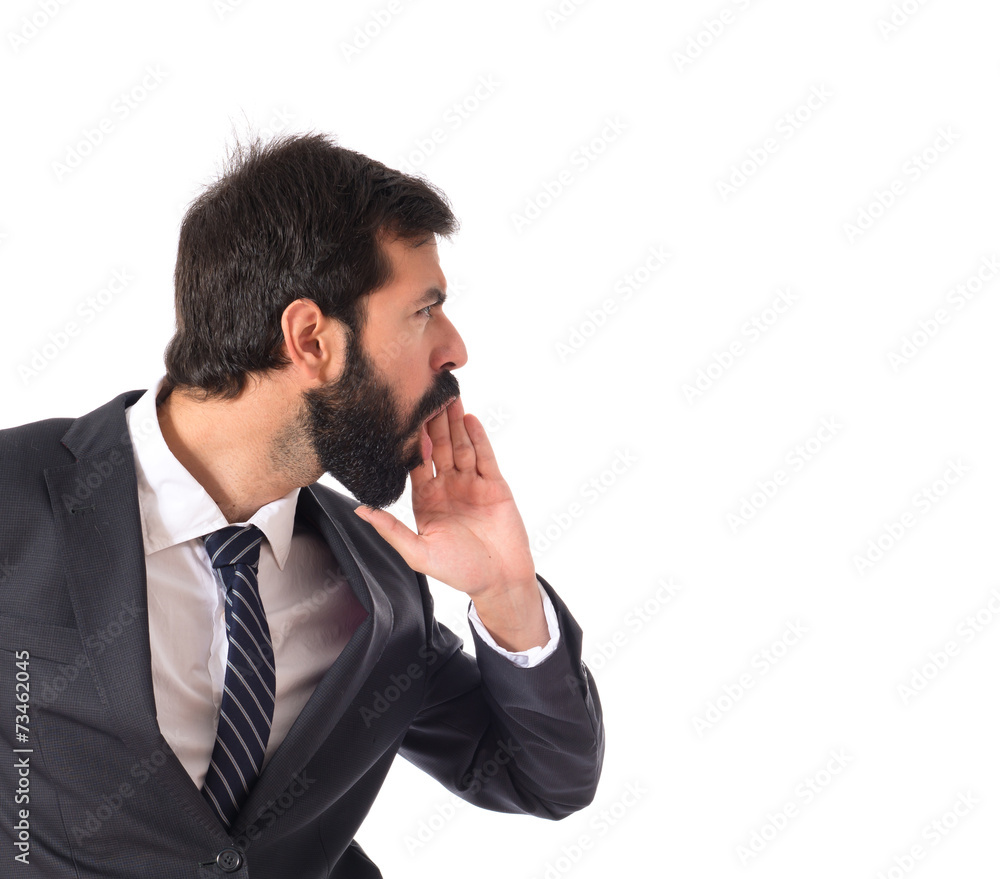 Businessman shouting over isolated white background Businessman shouting over isolated white background