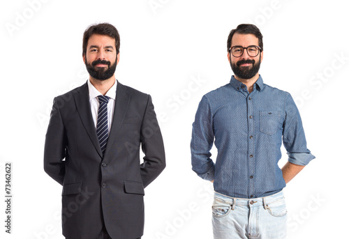 Twin brothers over isolated white background