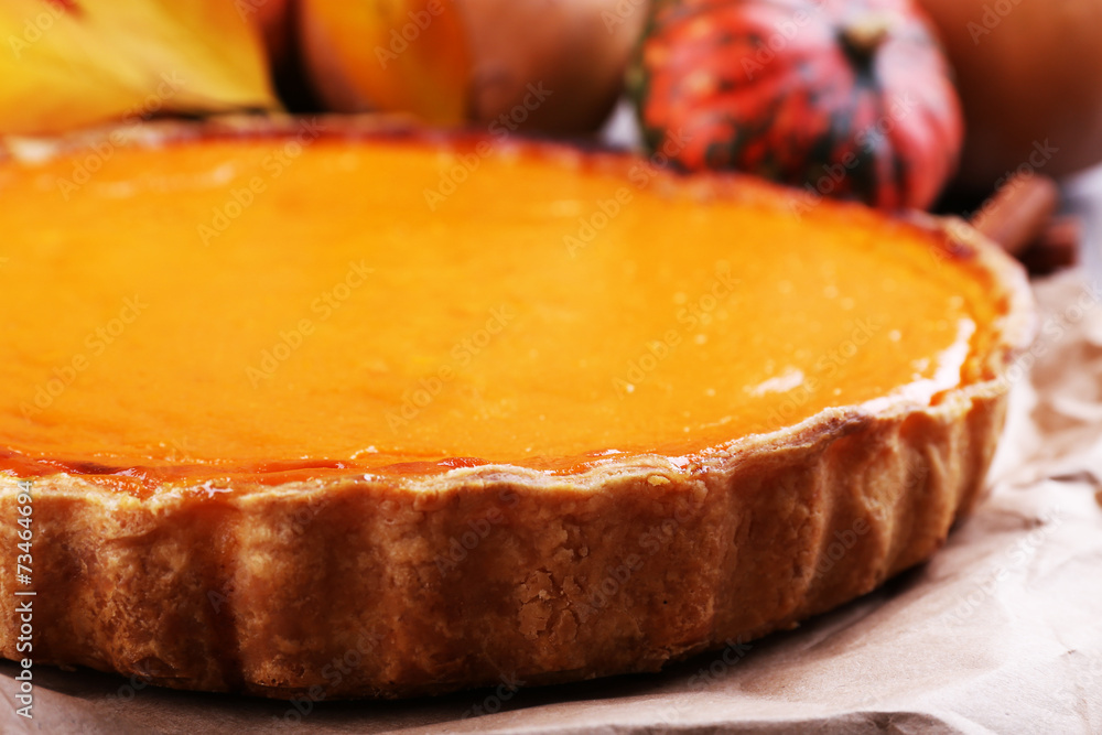 Homemade pumpkin pie on wooden background Homemade pumpkin pie on wooden background