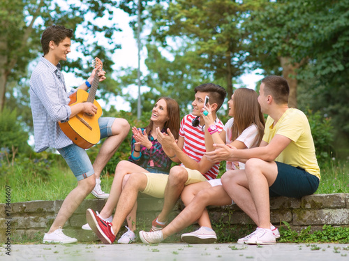 Group of friends playing music © Stock Rocket
