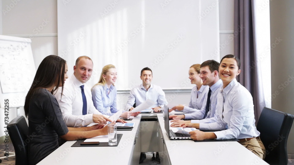 smiling business people meeting in office smiling business people meeting in office