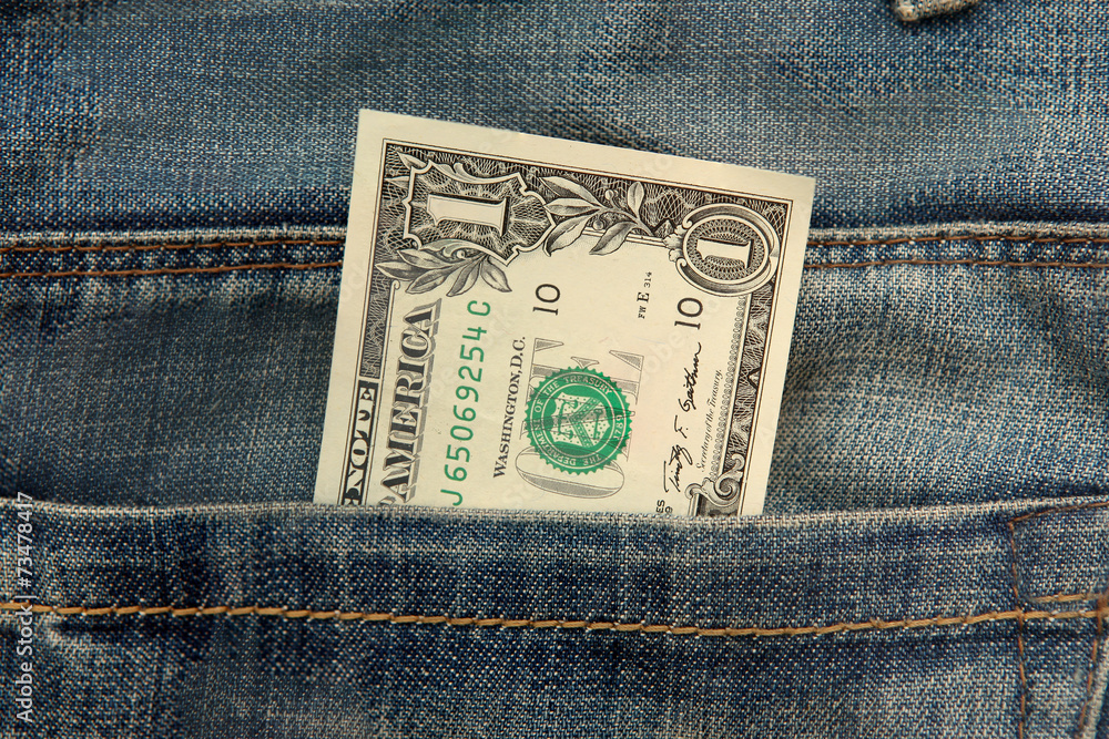 Dollar note in Jeans pocket Dollar note in Jeans pocket