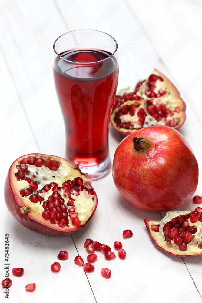 fresh pomegranate fruits and juice fresh pomegranate fruits and juice