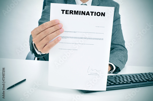 Quadro em tela man in suit showing a figured signed termination document