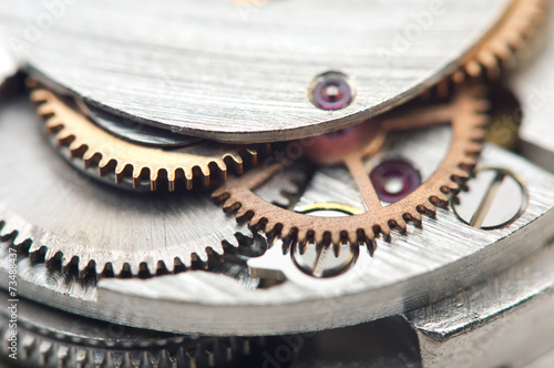 Background with metal cogwheels a clockwork. Conceptual photo