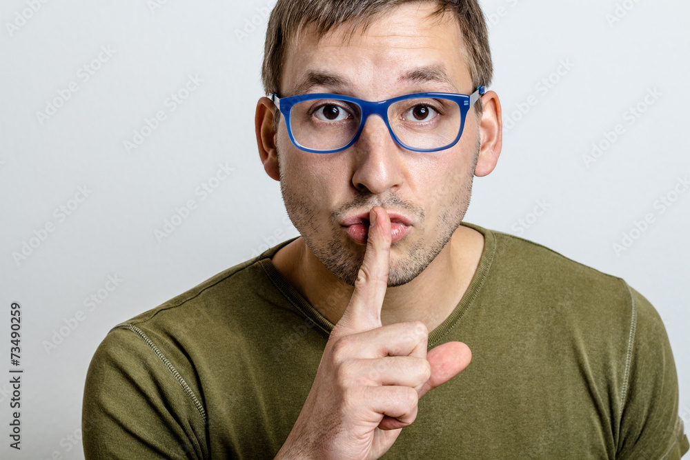 Young man asks for silence Young man asks for silence