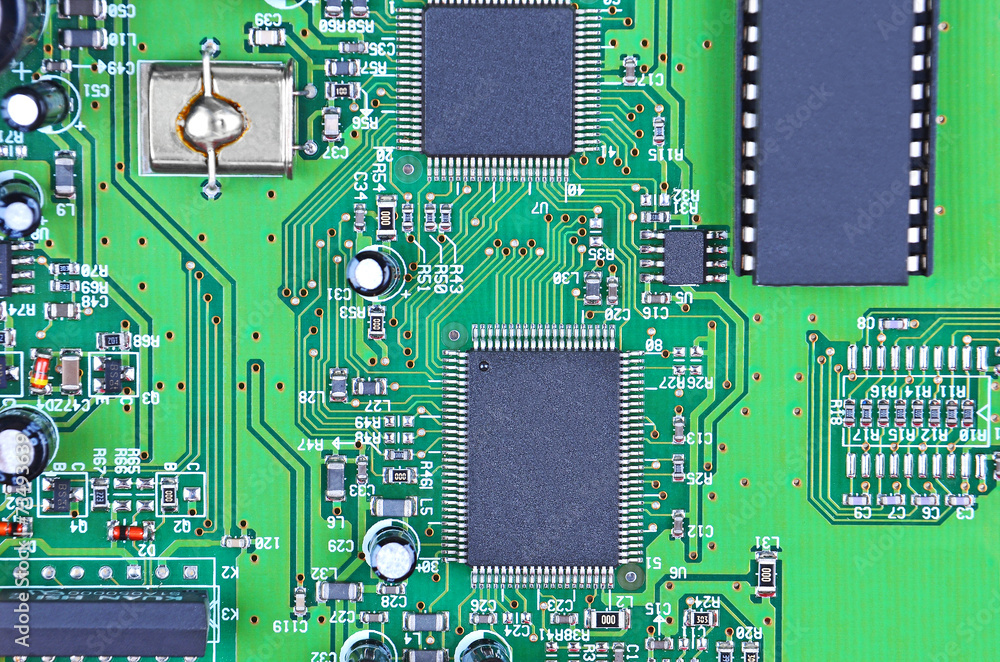 Printed computer motherboard with microcircuit, close up Printed computer motherboard with microcircuit, close up