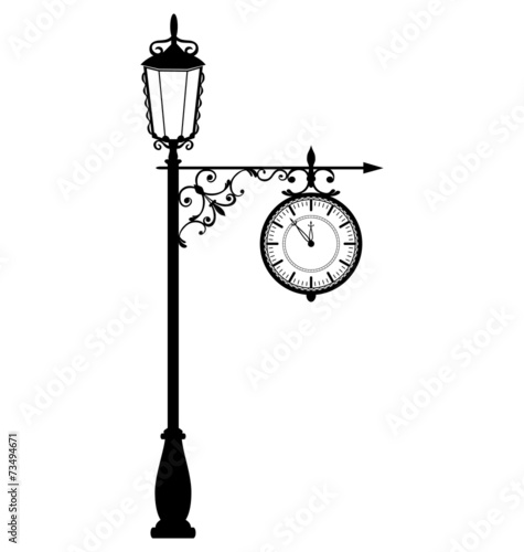 Vintage black lamppost with clock isolated on white background