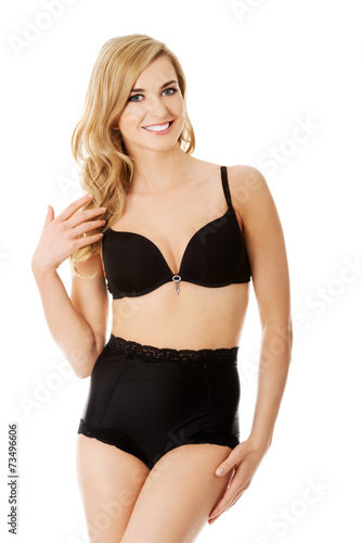 Happy young woman in lingerie